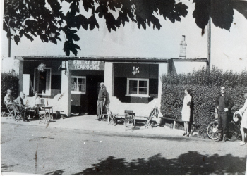 The old Fintry Bay Tearoom with visitors taking refreshments.