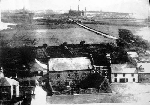 Greenfoot House with the Eglinton Ironworks in the background.