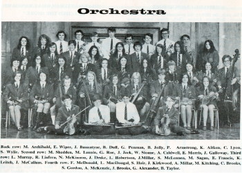 The Ardrossan Academy School Orchestra with Janice at the end of the second row.