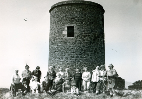 The old lighthouse on top of Little Cumbrae being visited in May 1983 by the Cumbrae Historical Society.