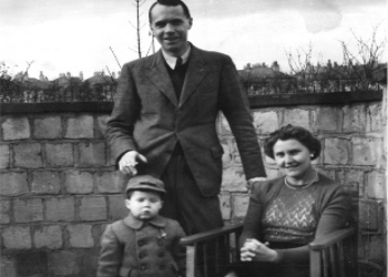 With my parents in the back garden of 21 Hillcrest Drive, most probably 1946/03, judging by buds on tree.