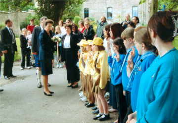 Princess Anne in the Garrison grounds meeting the local Guides and Brownies.