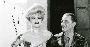 Robert Service with Marlene Dietrich.