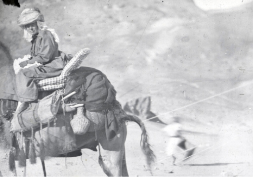 Mrs Margaret Gibson on a camel in the desert, in 1892. Image reproduced with the permission of Westminster College, Cambridge.