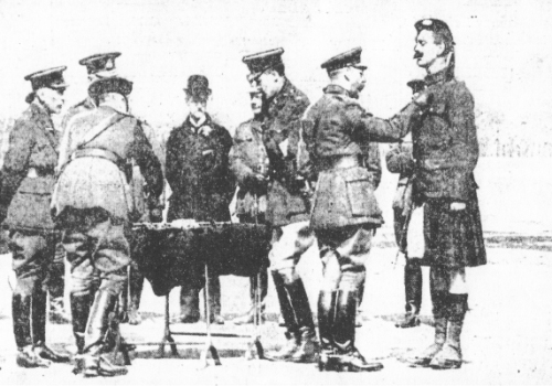 Ross Tollerton receiving his Victoria Cross from King George.
