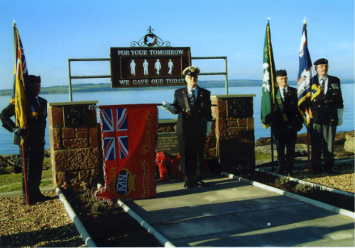 New War Memorial showing the silhouettes of members of the four war-time services.