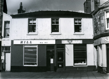 The Wedge in a pretty run-down condition when its neighbour was Hills Dairy.